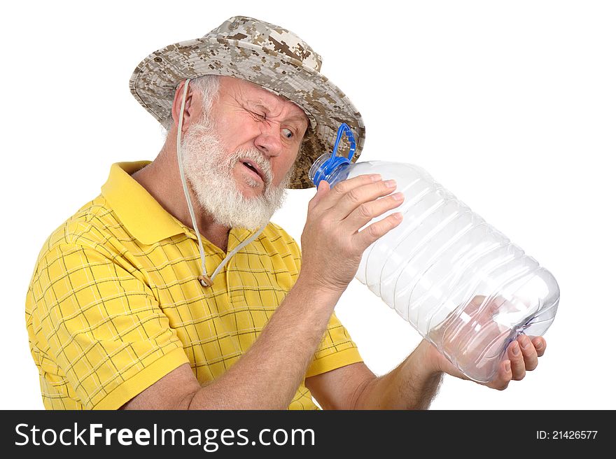 Senior man looking into empty bottle