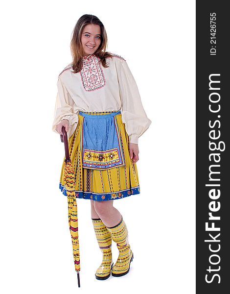 Traditional Estonian woman leaning on a closed umbrella. Traditional Estonian woman leaning on a closed umbrella