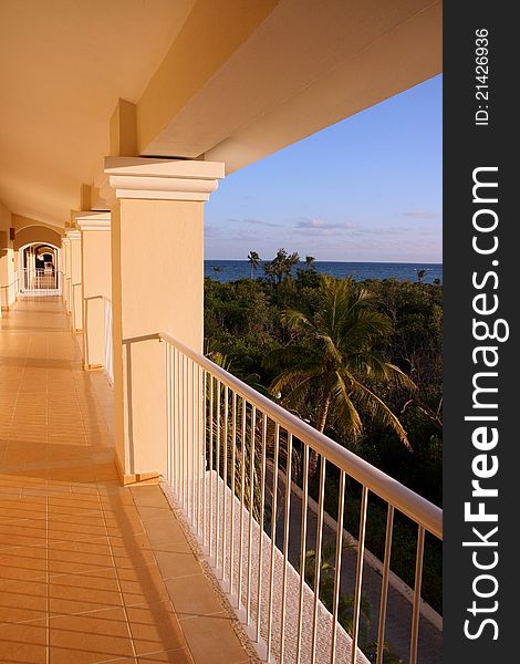 Long hallway to the room that has a view of the ocean. Long hallway to the room that has a view of the ocean.