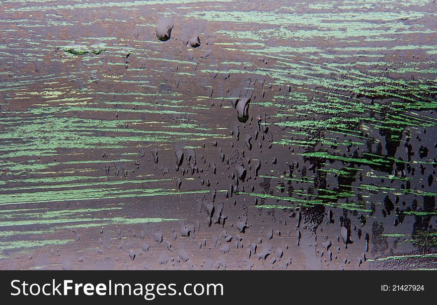 Drips of Water on Textured Metal