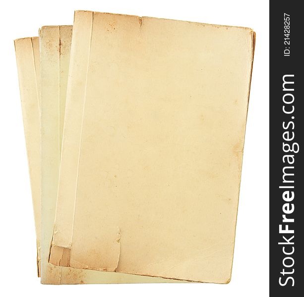 Pile of old book pages isolated on white