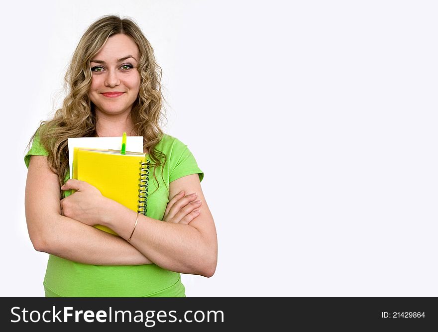 Woman in the green jersey with a notebook. Woman in the green jersey with a notebook