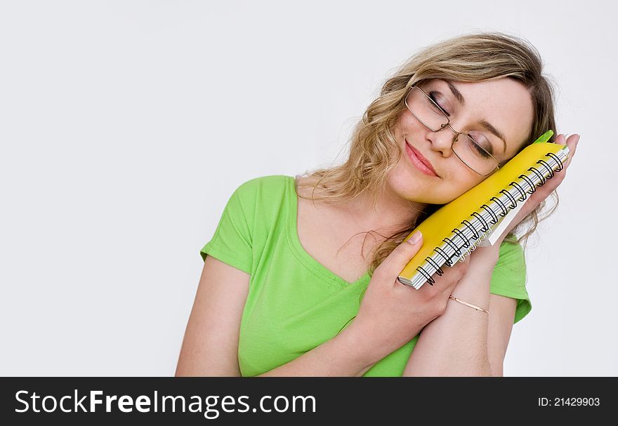 Attractive girl with a notebook