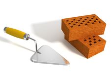 Two Perforated Bricks And Stainless Steel Trowel Stock Photography