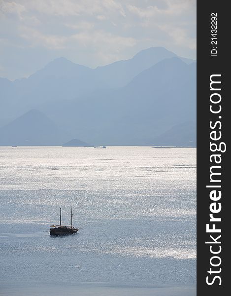 Boat in the bay at Antalya, Turkey, in the Mediterranean sea. Boat in the bay at Antalya, Turkey, in the Mediterranean sea