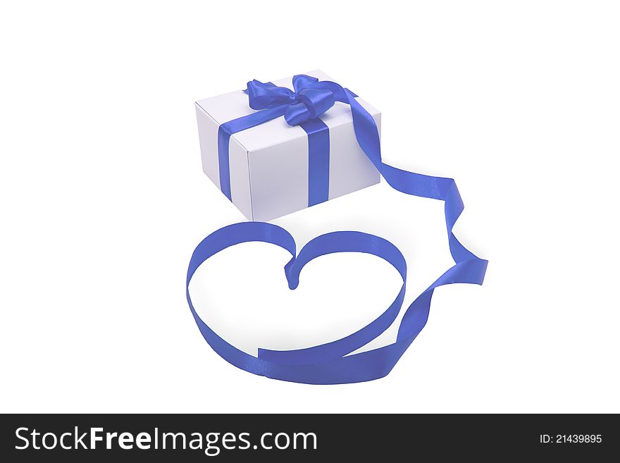 White gift with blue ribbon on a white background. White gift with blue ribbon on a white background