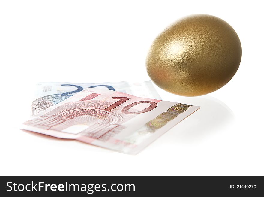 Euro and a golden egg over white bagground. Euro and a golden egg over white bagground