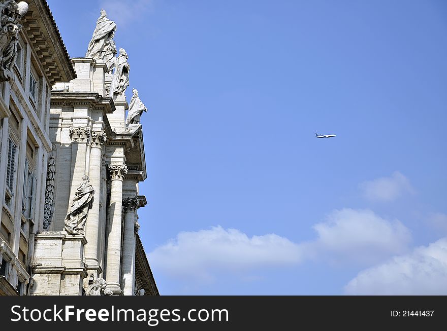 Airplane flying on Rome sky near Santa Maria Maggiore church. Airplane flying on Rome sky near Santa Maria Maggiore church