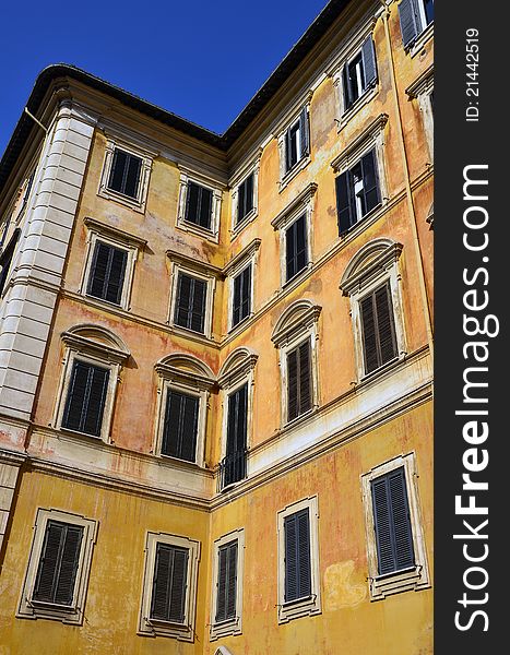 Yellow building corner in center of Rome