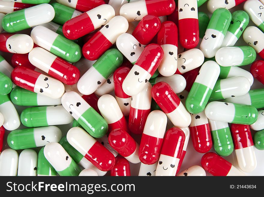 Green red and white happy emotion capsules. Green red and white happy emotion capsules