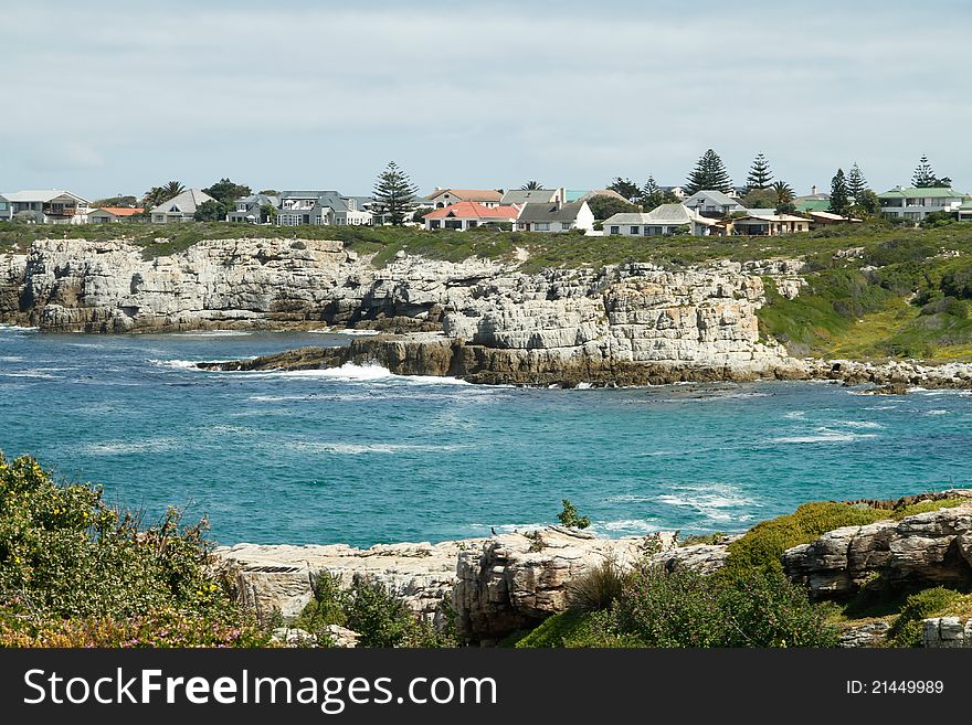 Seaside town with cliffs and ocean in the foreground Hermanus South Africa