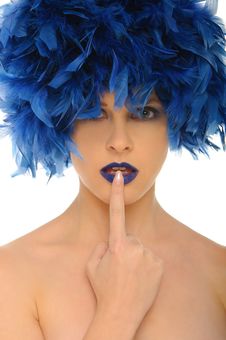 Woman With Blue Feathers Lips And Open Eyes Royalty Free Stock Photography