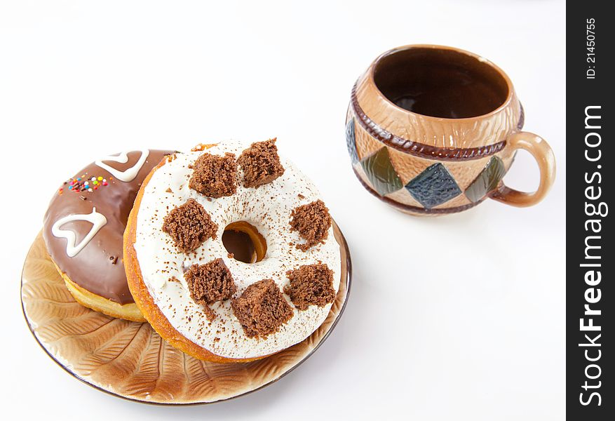 Donuts and coffee on white background