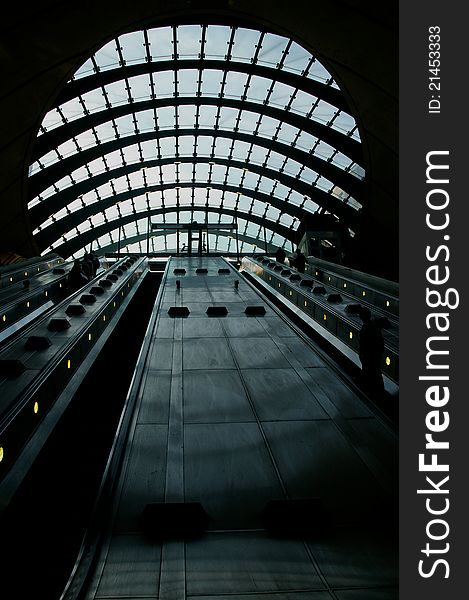 Looking upwards along the escalators leading to exit from Canary Wharf tube station. Looking upwards along the escalators leading to exit from Canary Wharf tube station