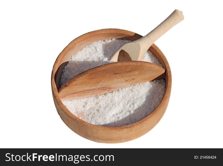 Salt-holder with wooden salt spoon white background