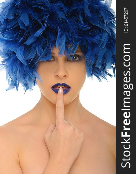 Woman with blue feathers lips and open eyes isolated on white