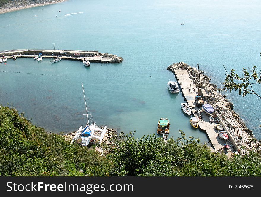 View of the marina on the Black Sea shore in summer. View of the marina on the Black Sea shore in summer