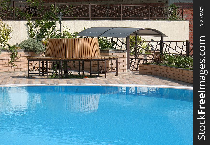 Courtyard Of A Resort Hotel With Swimming Pool