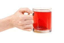 Female Hand With A Cup Of Red Tea Royalty Free Stock Photos