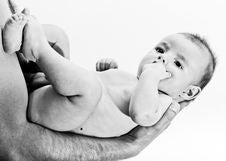Baby Being Held By Parents Palm Royalty Free Stock Photo