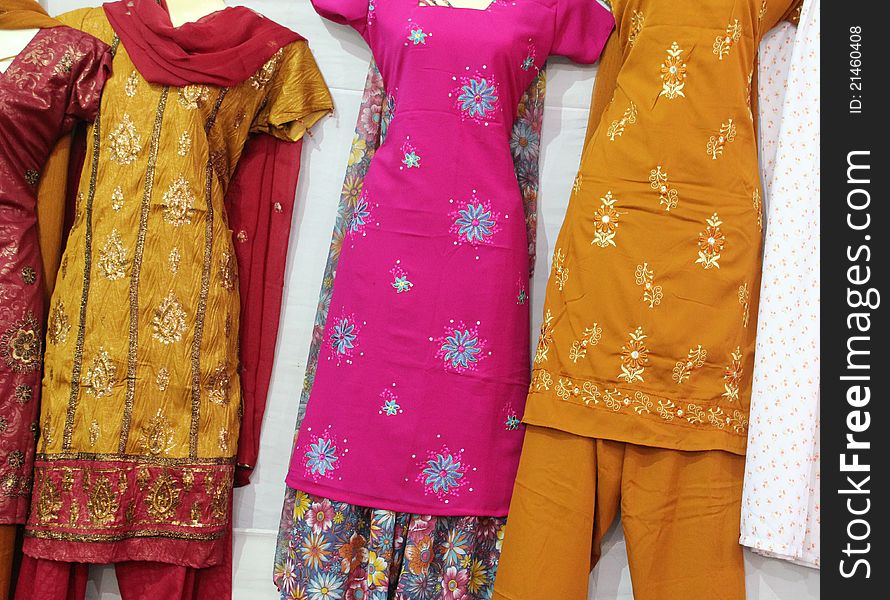 Ladies colorful salvar and kurtas on an indian market shop. Ladies colorful salvar and kurtas on an indian market shop