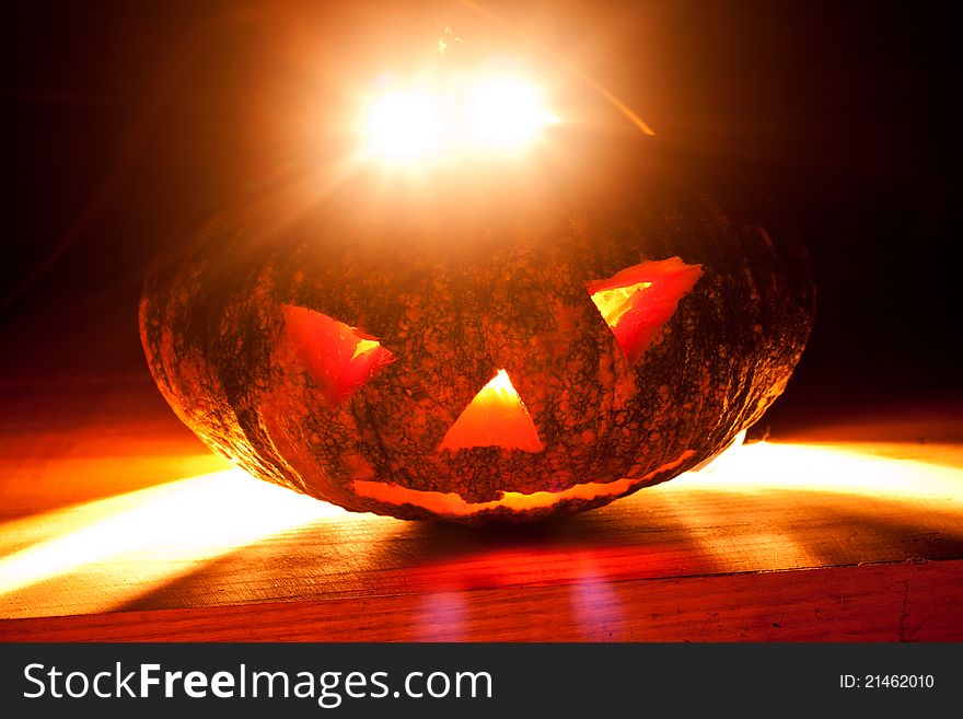 Halloween pumpkin on black background.