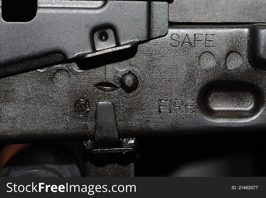 Closeup image of AK 47 shutter with safe and fire mode. Closeup image of AK 47 shutter with safe and fire mode