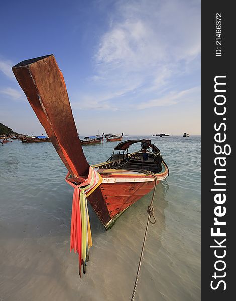 Traditional Thai Longtail boat on the beach, at lipe island.