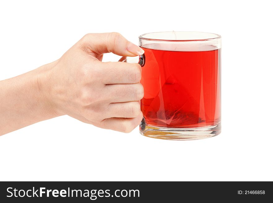 Female hand with a cup of red tea on a white background