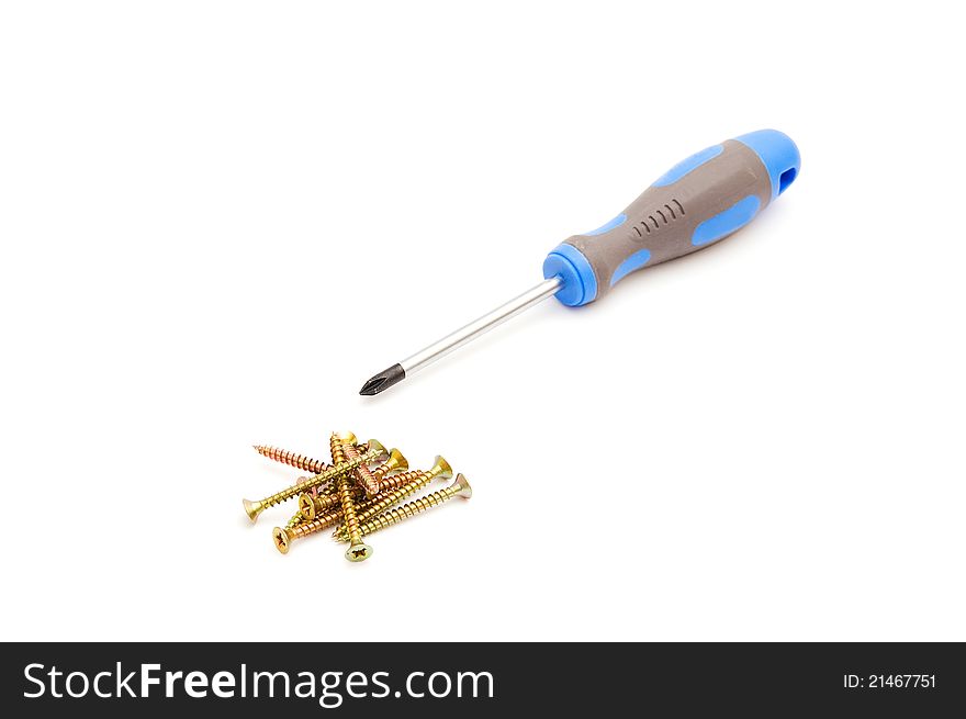 Screwdriver and yellow screws on white background