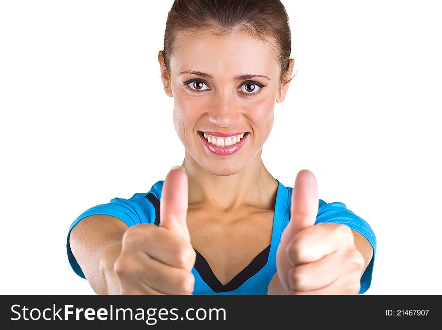 Beautiful girl showing a thumbs up, isolated on white background