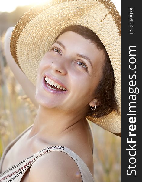 Portrait Of Beautiful Brunette Woman In Summer