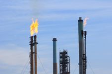 Flames Out Of Chimneys Against Light Blue Sky Royalty Free Stock Images Flames Out Of Chimneys Against Light Blue Sky Royalty Free Stock Images