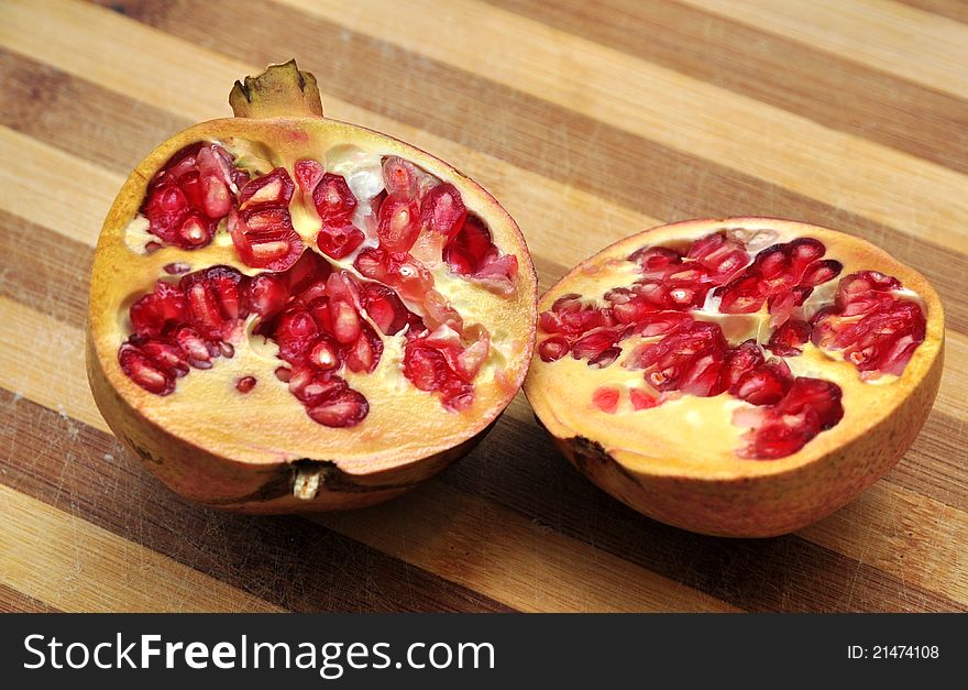 Cut pomegranate full of seeds