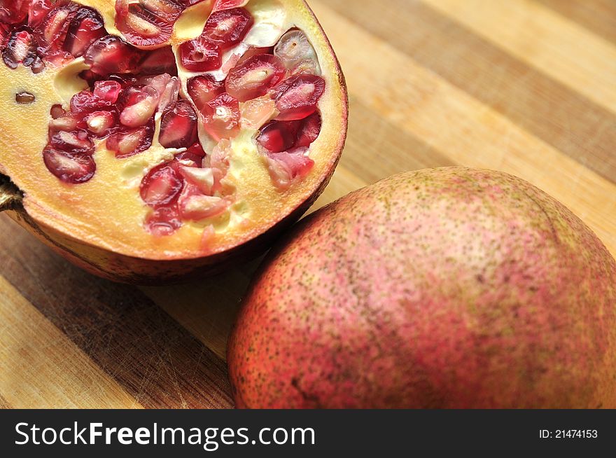 Cut pomegranate full of seeds