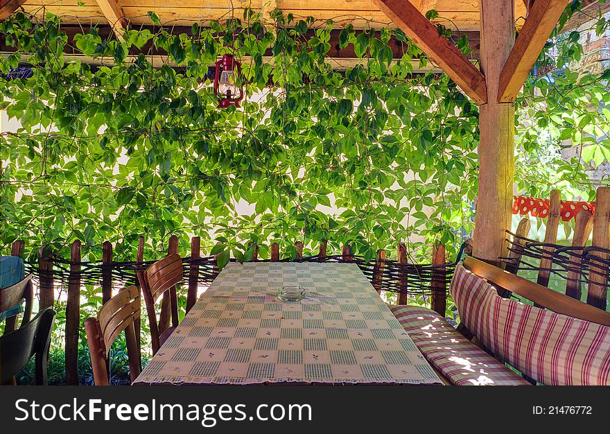 Interior of a balcony with leafs.