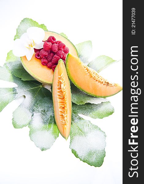 Fruit-based dessert with melon and raspberries. Fruit-based dessert with melon and raspberries