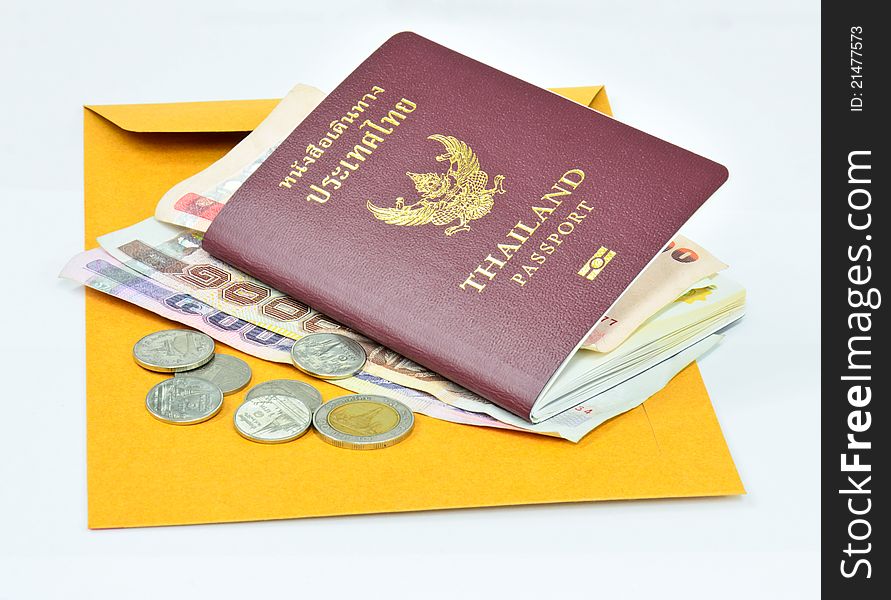 Thailand passport and Thai money on Brown envelope with white background