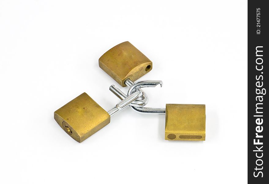 Three Linked Brass Padlocks