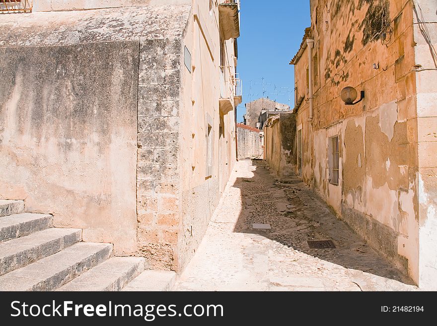 Narrow street in baroque style town - Noto, Sicily