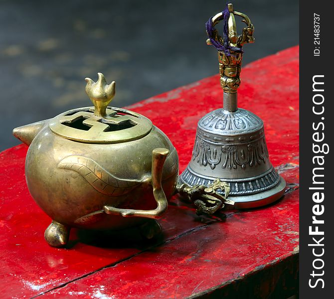 Traditional Tibetan bell, dorje and precious pot, used in buddhist ceremonies. Traditional Tibetan bell, dorje and precious pot, used in buddhist ceremonies.