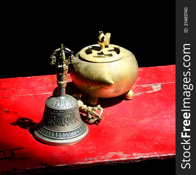 Traditional Tibetan bell, dorje and  precious pot, used in buddhist ceremonies. Traditional Tibetan bell, dorje and  precious pot, used in buddhist ceremonies.