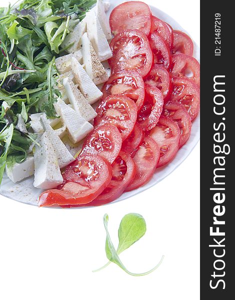 Tricolor salad dish made with cheese and tomatoes. Tricolor salad dish made with cheese and tomatoes