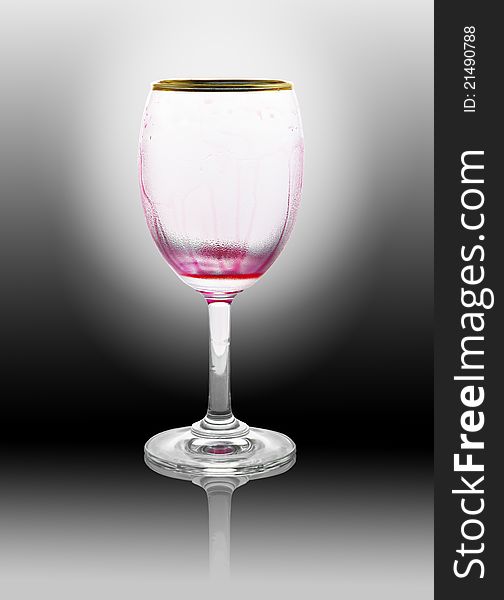 Red wine glass is empty on black background. Red wine glass is empty on black background