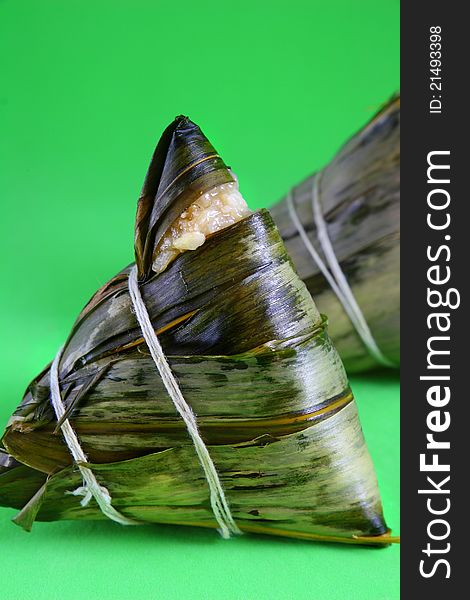 Traditional Chinese rice pudding on green background