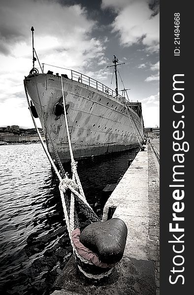 Old and rusty command military ship i harbor. Old and rusty command military ship i harbor