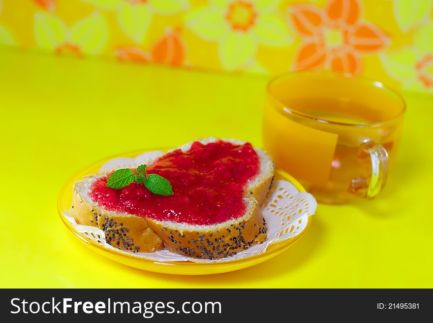 Strawberry jam on a white bread decorated on yellow background. Strawberry jam on a white bread decorated on yellow background