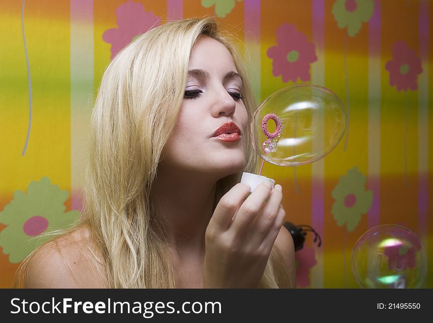 Beautiful blonde girl with soap bubbles. Beautiful blonde girl with soap bubbles