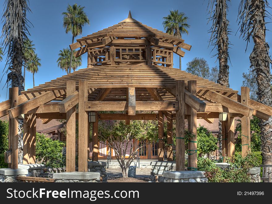 Wood Gazebo with blue sky.