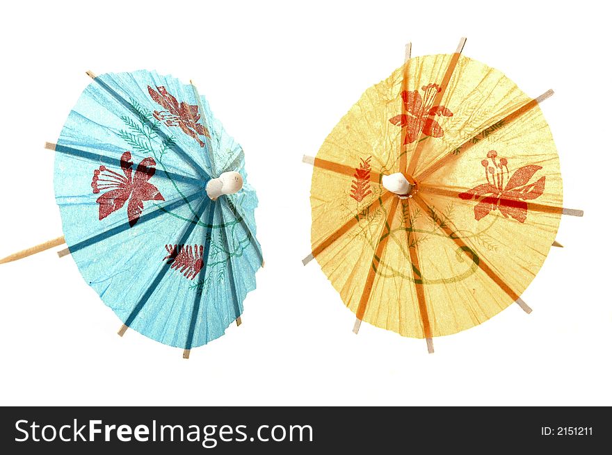Colorful paper umbrellas isolated on a white background.